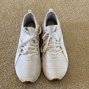 Women’s white and gold Puma Size 9.5.